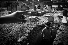 Grave being dug at the cemetery, or local Karbala, for burying taziya.
