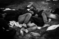 Tired men take a nap under a tree shade. There is little sleep in the days leading to Ashura.